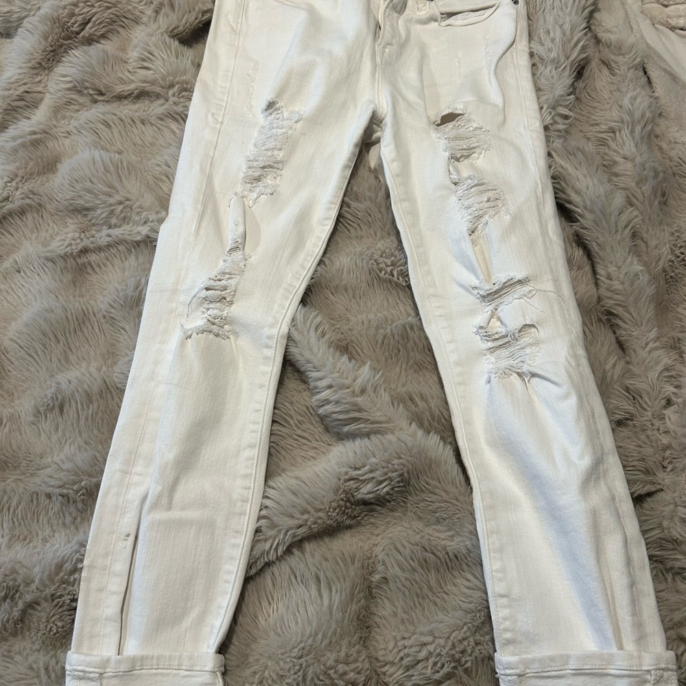 Good American White Skinny Jeans with Distressed Detailing